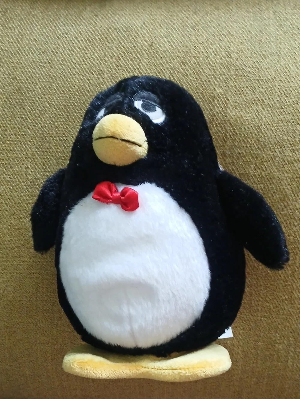 Disney Black & White Penguin Plush with Red Bow. From Toy story Movie.